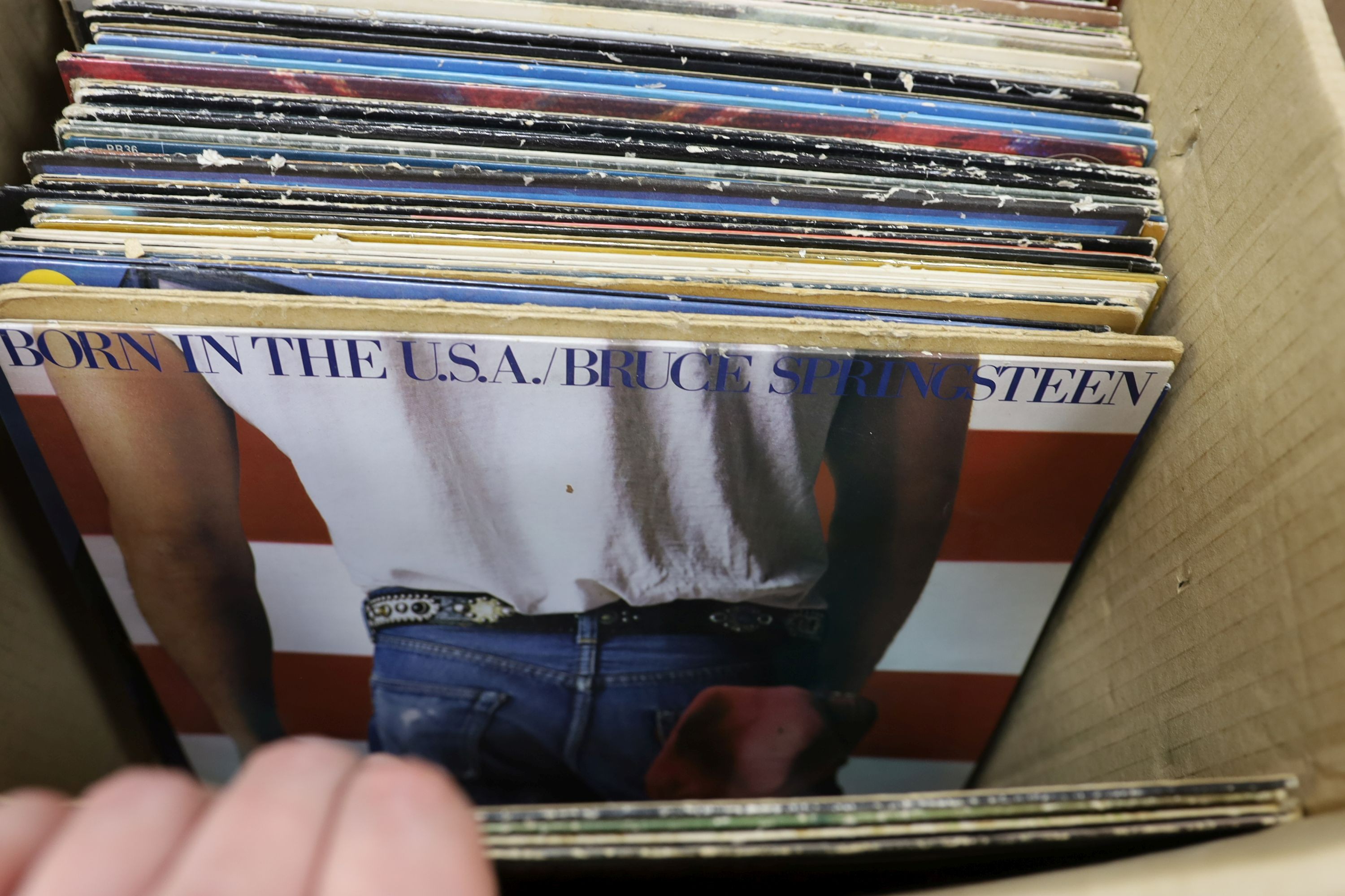 A collection of approximately 87 vinyl LPs to include The Beatles, David Bowie, Traffic, 10CC, Carly Simon etc